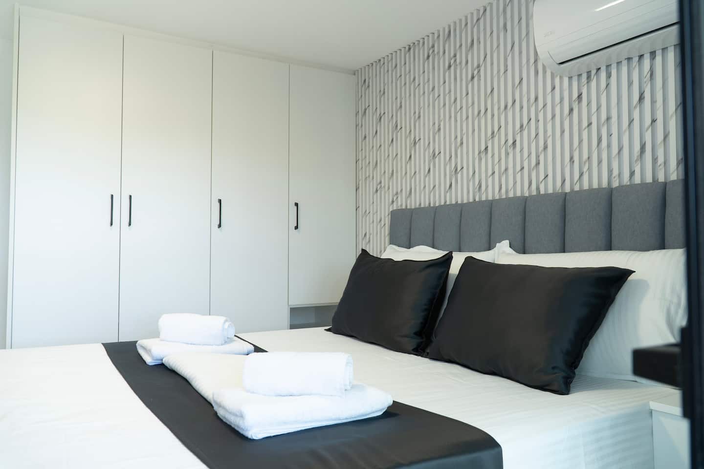 A calm, air-conditioned bedroom